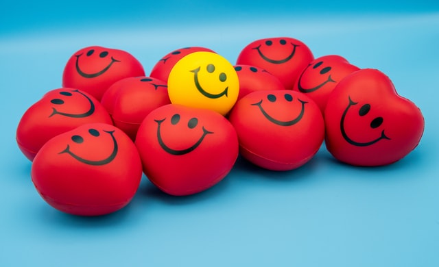 A group of smiley stress balls